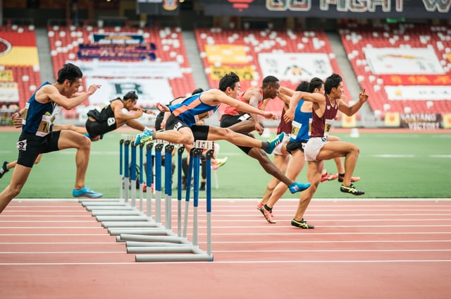 Hurdlers on a track 